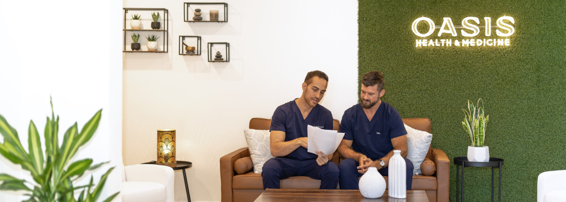 Dr. Pedi and Dr. Dan Sullivan inside the Oasis Health and Medicine clinic