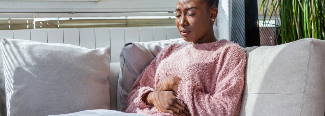 A woman's physical and emotional distress due to an illness or ill feeling