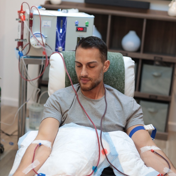 Man receiving EBOO therapy